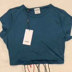 Gymshark speed midi top-teal lagoon SIZE SMALL.